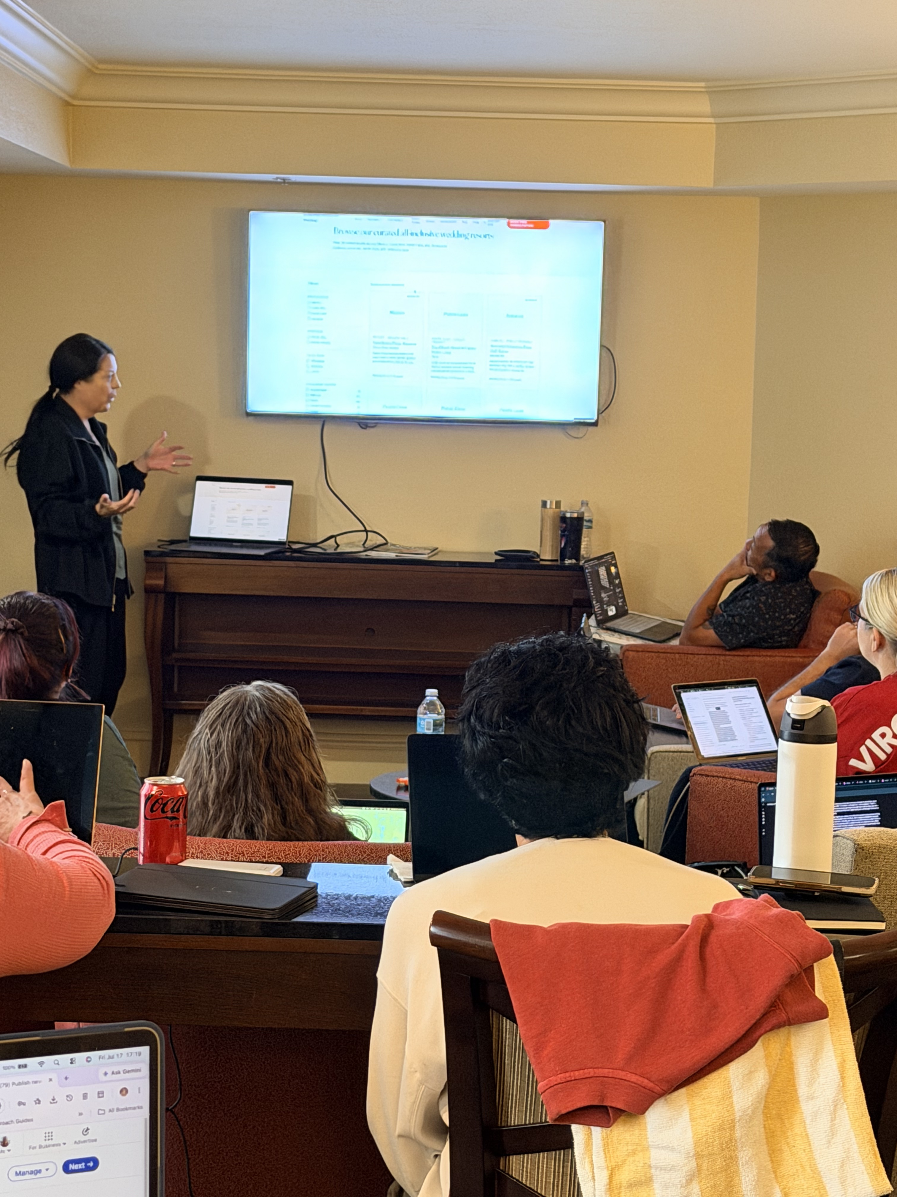 Presenter leading a workshop session for attendees with laptops at a Rosen Centre Hotel MasterClass event in Orlando